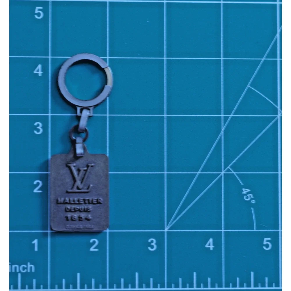 Louis Vuitton Malletier Depuis 1854 Brass LV Key Ring Bag Charm